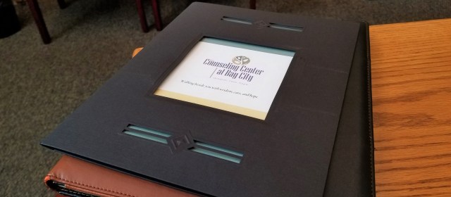 Folder with the forms for the Initial Consultation at The Counseling Center at Bay City, Green Bay, WI